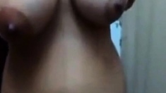 Pakistani girl playing with her Boobs